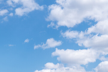 Naklejka na ściany i meble Cloudy blue sky on sunny day. Blue sky with clouds.