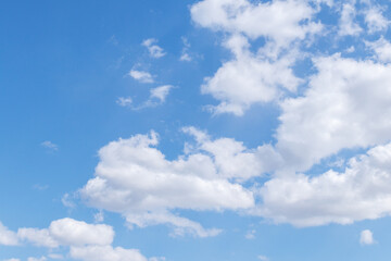 Naklejka na ściany i meble Cloudy blue sky on sunny day. Blue sky with clouds.