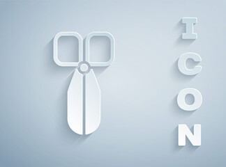 Paper cut Scissors icon isolated on grey background. Cutting tool sign. Paper art style. Vector Illustration.