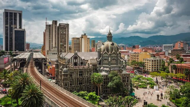 Zoom out time lapse view of Plaza Botero square in the Old Quarter of Medellin, Antioquia Department, Colombia.	
