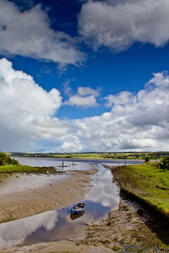 River estuary with blue cloudy sky