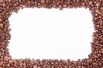 Frame made of fresh roasted coffee beans. Copy space. Top view.