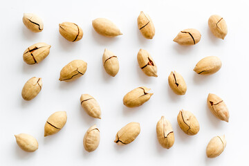 Pecan nuts pattern. Food background, top view