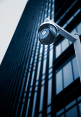  Security surveillance cameras in front of high-rise business district buildings, Shanghai
