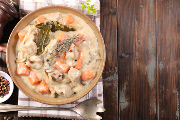veal cooked with cream and carrot