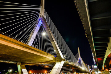 Boston, Massachusetts, USA The Leonard P. Zakim Bunker Hill Memorial Bridge at night and the downtown.