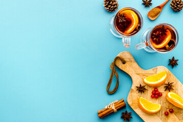 Mulled hot wine with ingredients, top view, copy space