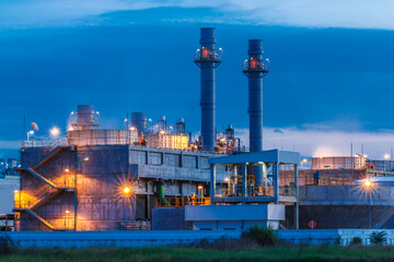 Fototapeta premium Twilight image of a power plant in a beautiful evening.
