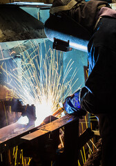 Industrial steel welder in factory