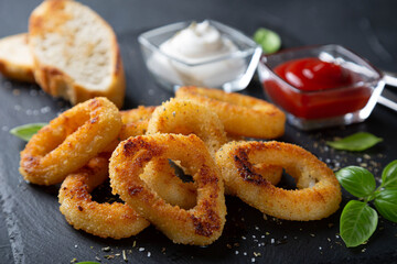 Squid rings or onion rings with sauces