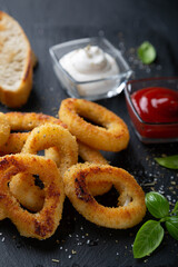 Squid rings or onion rings with sauces