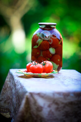 tomatoes in glass jar