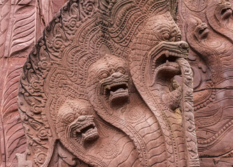 Naga sculpture at stone carving at Thailand