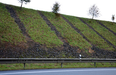 gravel gray basalt, coarse is used as drainage strips above the road in the notch of the highway....