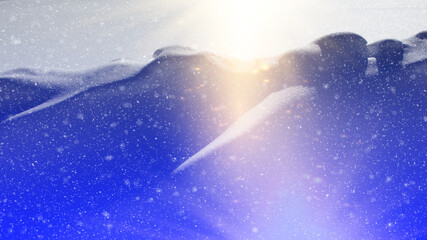 Evening bright sun and snow. snowdrift deep blue snow-covered Park. blurry background beautiful landscape.