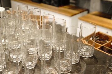 Empty glasses on the table. Set of different glasses.