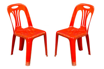 Red plastic chair on white floor.