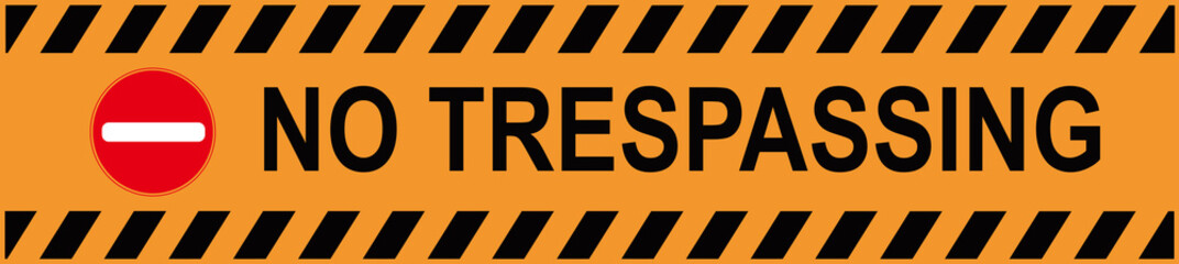 A sign that says : NO TRESSPASSING