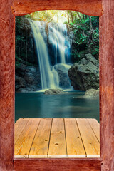 Window framed with beautiful views of the waterfall in front.