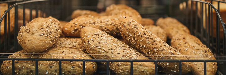 Freshly baked bread on bakery shelves.