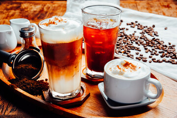Coffee latte, cappuccino,black espresso and glass collection with coffee beans on wood table ,  The drink menu . cafe image