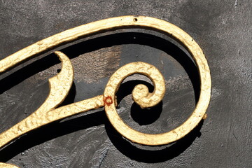 forged twisted fence and black gates