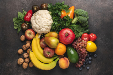 Various of fruits and vegetables on brown concrete background. Healthy food to immune system