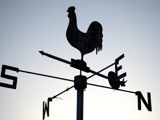 cockerell weather vane in silhouette 