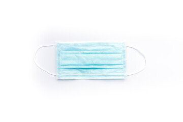 Surgical mask isolated on white background.Concept : Medical waste disposal during the novel COVID-19 pandemic.