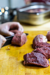 raw meat on a chopping board