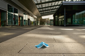 Antivirus mask in an empty abandoned market mall