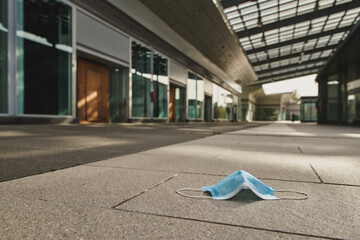 Antivirus mask in an empty abandoned market mall