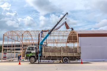 Technician install tensile fabric structure