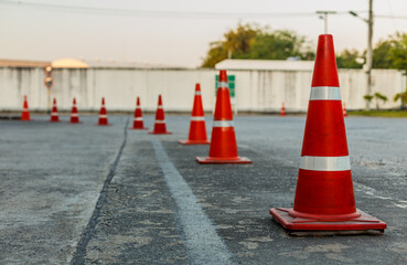 Orange traffic cone in white background