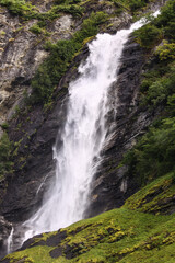 Fototapeta na wymiar Huge waterfall in Norway falling down the rock