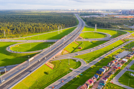 Aerial view of highway interchange. Road junction in the suburbs.