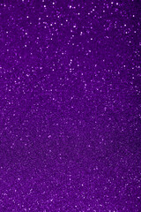Abstract violet purple blurred sparkling background with focused area. Holiday festive concept....