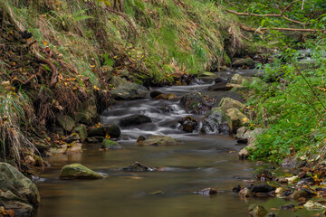Naklejka na ściany i meble Krasetinsky creek near confluence with Kremzsky creek with small waterfall
