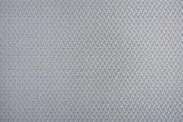 Surface of grey checkered fabric. Abstract grey pattern.