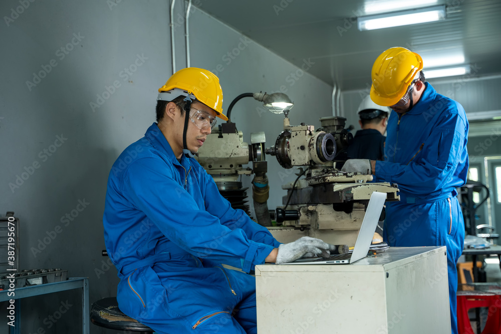 Poster the industrial worker team working in factory with the machine.