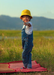 A girl who plays naughty on an outdoor field