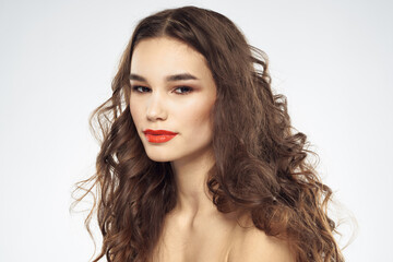 Fototapeta premium Elegant woman with bare shoulders red lips glamor attractive look cropped look