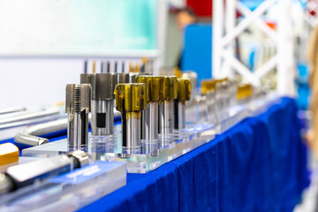 New and precision metal tapping cutting tools for threaded hole making with rust resistant coating in manufacturing process on table