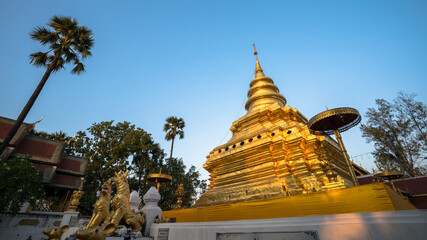 Wat phra that si chom thong worawihan, A famous Buddhist temple with colorful statues and a...
