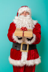 Santa offering Christmas presents