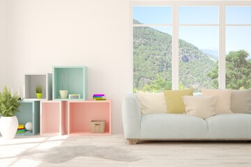 White living room with sofa and summer landscape in window. Scandinavian interior design. 3D illustration