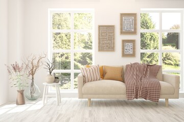 White living room with sofa and summer landscape in window. Scandinavian interior design. 3D illustration