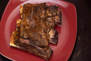 A piece of an oven grilled piece of ribs