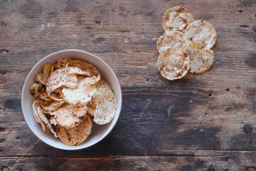 Brown rice chips with chia and quinoa seeds , healthy food concept