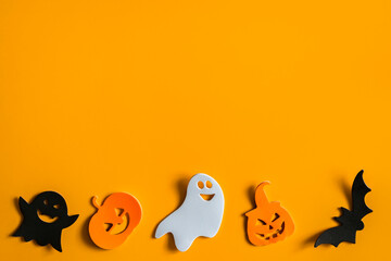 Halloween symbols on an orange background. Halloween concept.